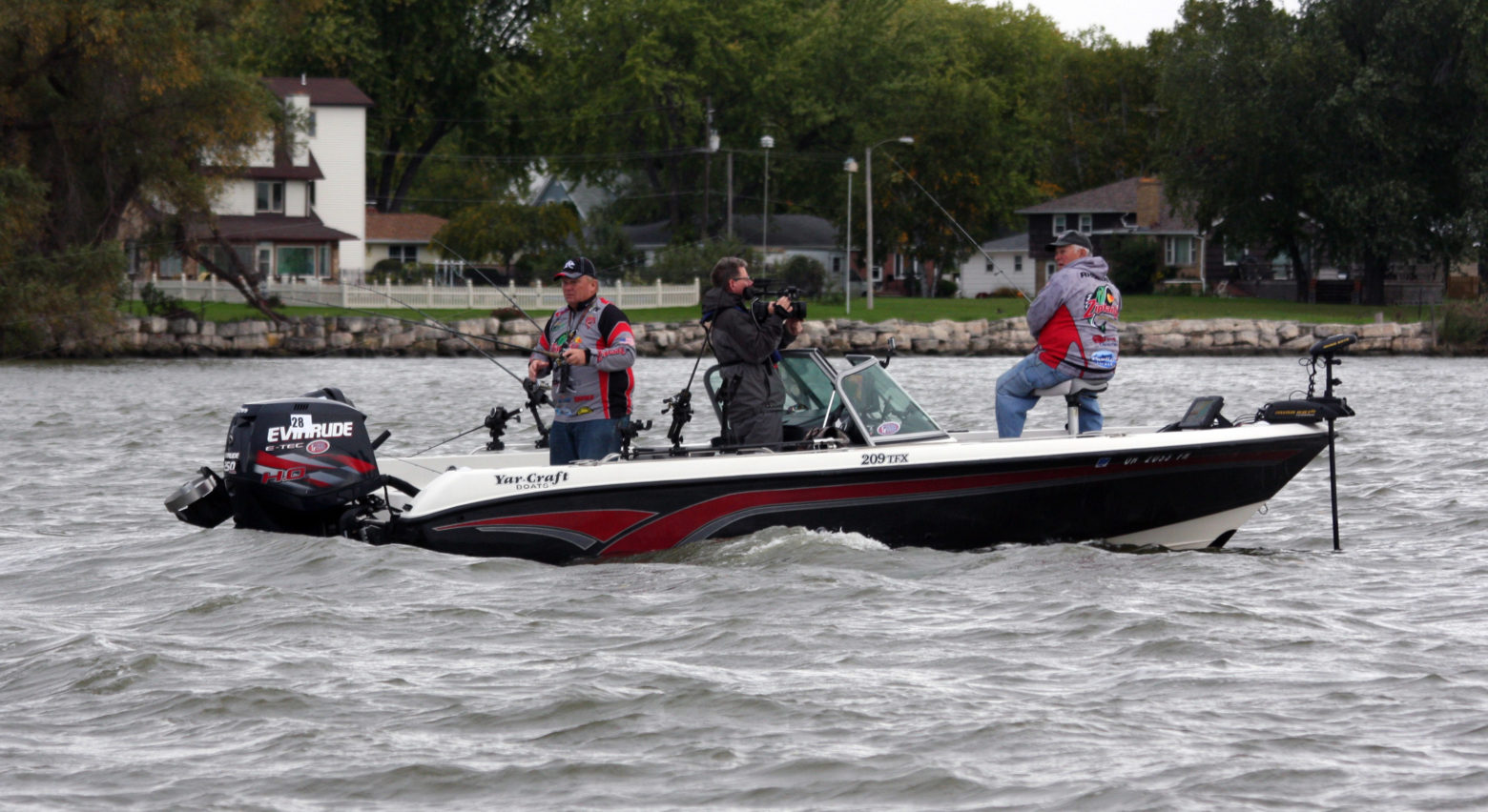 With a TV camera person aboard to record the action for national airing, Gaines and Rhodes tested the waters of the Fox River.